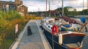 A Cruiser Kits boat moored by a pontoon