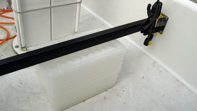 Stacking boxes being used to hold up a track on a boat