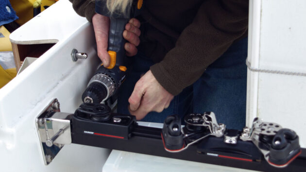 A man drilling on a boat