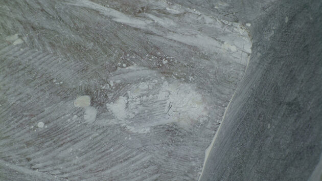 An old repair was revealed beneath the gel coat but it had not penetrated the hull