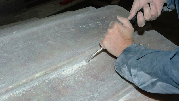 Various voids in the lay-up where the resin had not penetrated during building were scraped out using a special tool that looks remarkably like a big screwdriver!