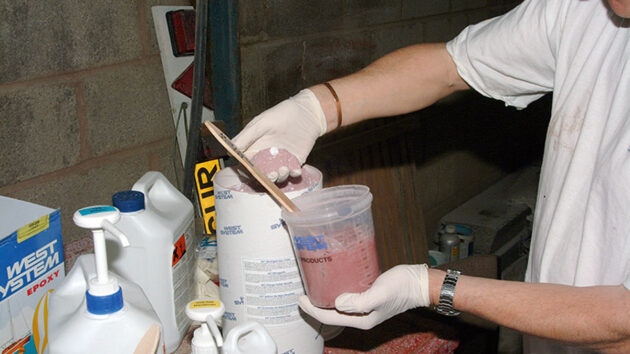 The resin and hardener are mixed in the normal manner after which handfuls of filler are added to the mix and stirred in until a peanut butter consistency is achieved