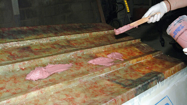 It is then applied to the surface with a stirrer in preparation for spreading and fairing