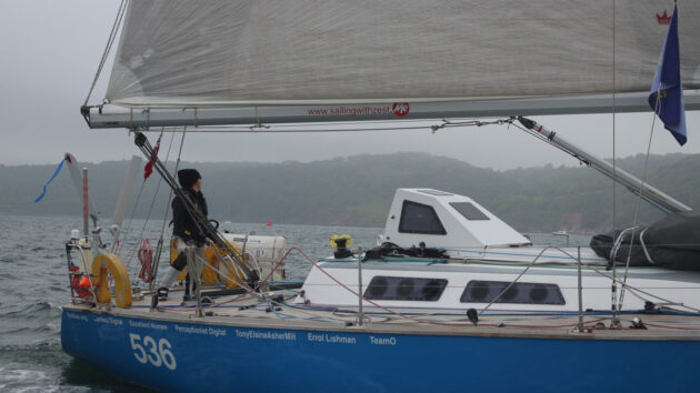 A woman sailing a yacht