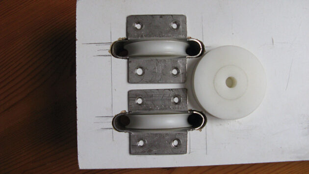 Keel sheaves in jig with a loose sheave to give the slot spacing