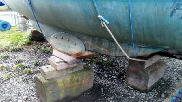 boat feet on a motorboat on the mud