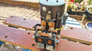 A boat bow thruster motor on a workbench