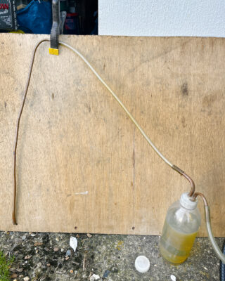 Fuel being drawn to solve contaminated fuel problems on a boat