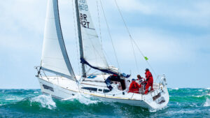 A crew sailing a Jeanneau Sun Odyssey 32