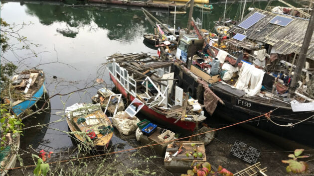 Sailors Creek before volunteers cleared out the abandoned boats. Credit: www.sailorscreekcic.org