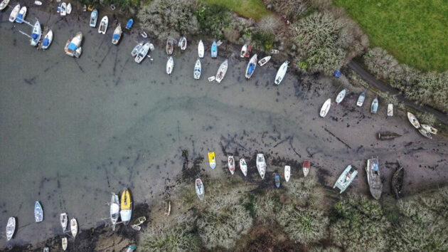 Aerial view of abandoned boats in a Falmouth area estuary. Credit: Clean Ocean Sailing