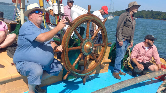 Skipper Wes aboard Thames barge Thistle