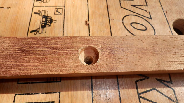 A hole drilled into work for making a new boat berth