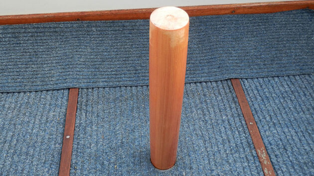 A wooden pedestal for a boat berth panel