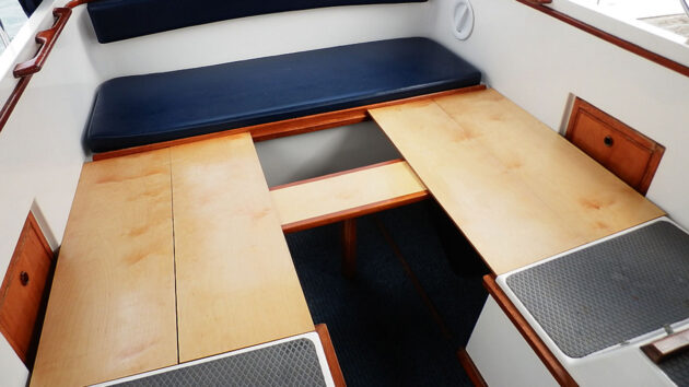 A table acting as a support for a boat berth