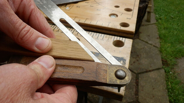 Mitres for a berth on a boat being checked on a workbench