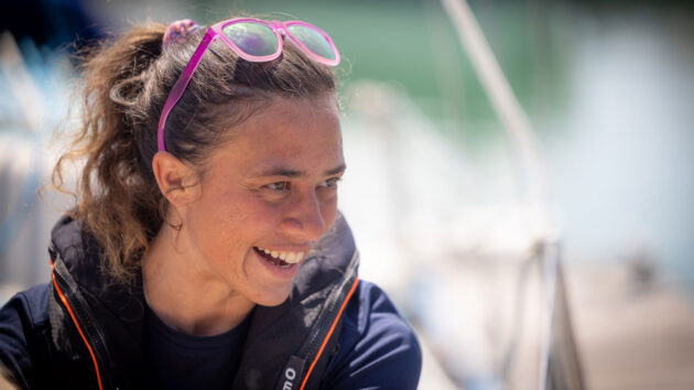 After 28 days and 50 minutes at sea, solo sailor Jazz Turner smiles at a rapturous welcome at Brighton Marina. Credit: Fergus Kennedy