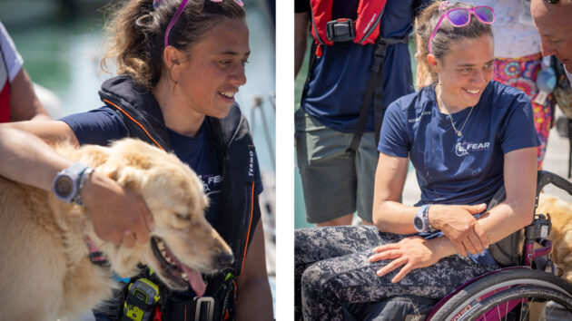 Solo sailor Jazz Turner, first disabled person to complete a non-stop, unassisted circumnavigation of the UK and Ireland, with her dog and her wheelchair at the voyage finish at Brighton Marina. Credit: Fergus Kennedy