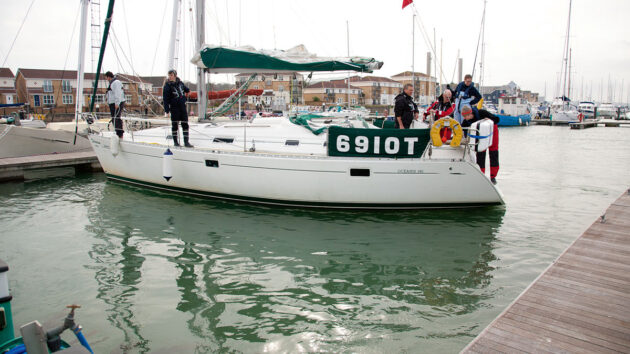 Sailors marine mooring on a yacht