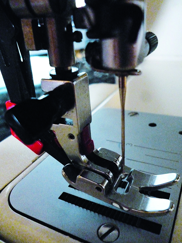 the foot of a sewing machine