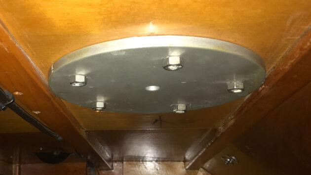 A backing plate on a boat to help secure deck fittings