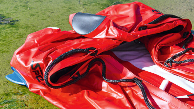A boat being inflated on a slipway