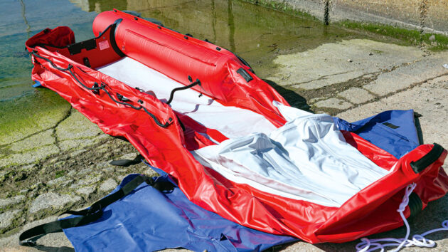 A SpearFish 520 boat being inflated on a slipway