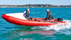 Two men not wearing lifejackets aboard SpearFish 520 inflatable boat