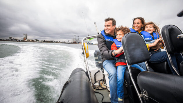 People trying a powerboat