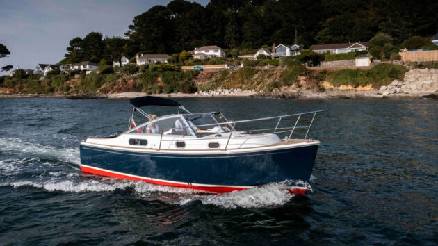 Duchy 25 motorboat being sailed off the coast
