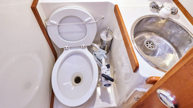 A toilet sea and toilet on a boat
