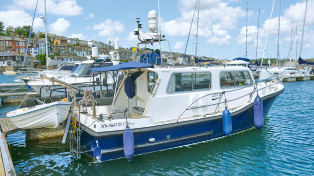 A motorboat moored in a marina