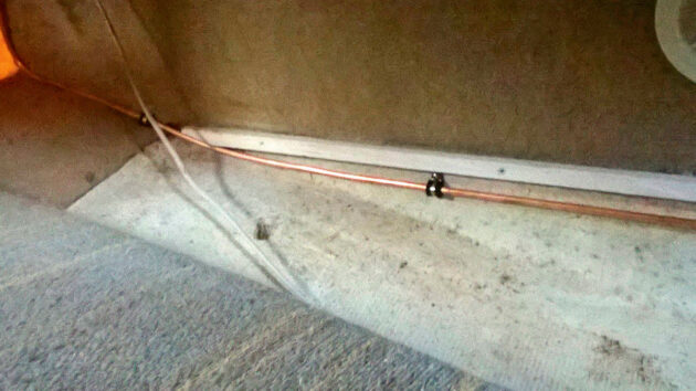 Copper pipe on a boat for carrying marine gas