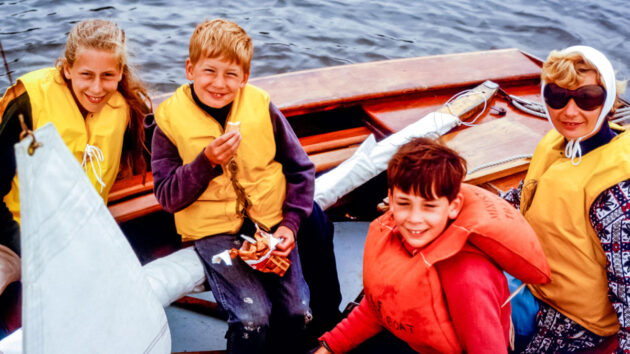 Children sailing in a boat as part of a Royal Yachting Association programme