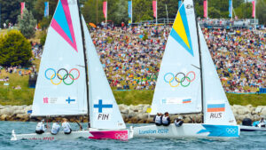 London 2012 Olympics, Sailing at the Weymouth & Portland Venue, Dorset, Britain, UK. August 11th, 2012 Mikaela Wulff, Silja Kanerva and Silja Lehtinen of Finland win bronze in the women's Elliott 6m sailing class. Credit: Dorset Media Service/Alamy