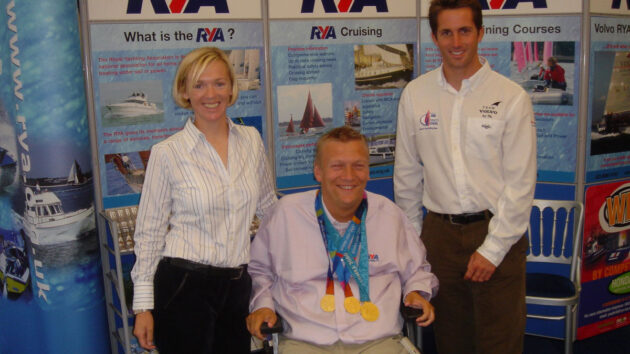 Geoff Holt MBE, pictured here with Shirley Robertson, OBE, and Ben Ainslie, OBE, is proud to have been part of the Royal Yachting Association Sailability history