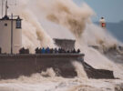 Waves crash against the harbour wall during Storm Brian at Porthcawl, South Wales on 21 October 2017. Credit: Matthew Horwood/Alamy