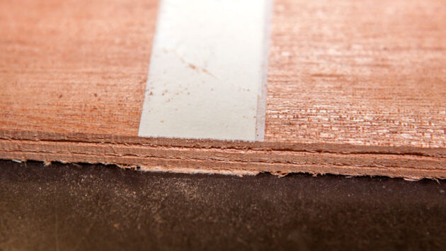 Veneers being cut for cold moulding