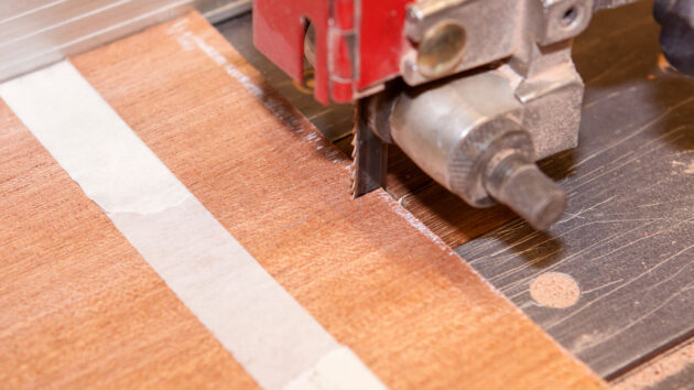 Veneer planks being cut for cold moulding