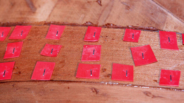 Staples on the hull of a boat