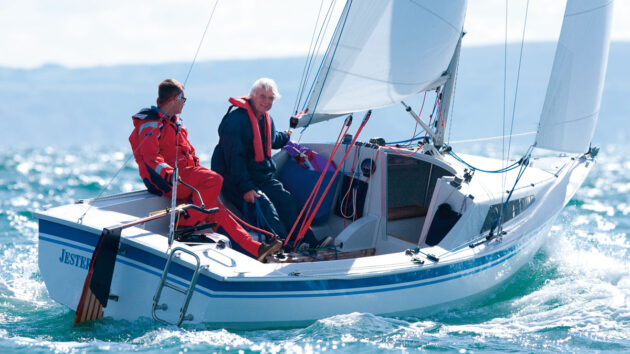 Two men sailing a Hawk 20