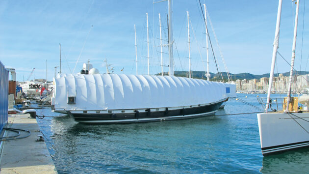 A boat with a cover on it