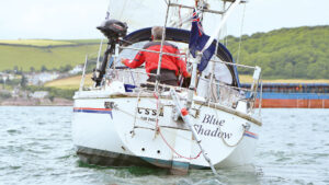 A boat with vane gear fitted to the stern for steering