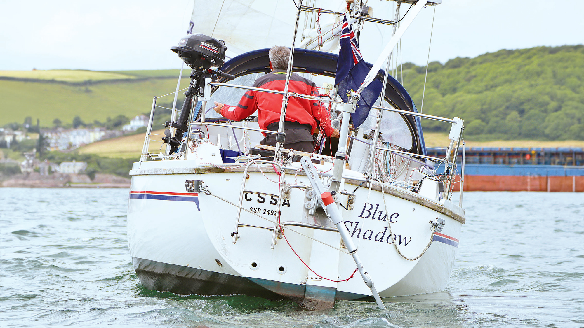 A boat with vane gear fitted to the stern for steering
