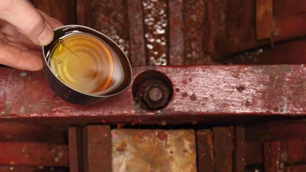 Oil being used to loosen keel bolts
