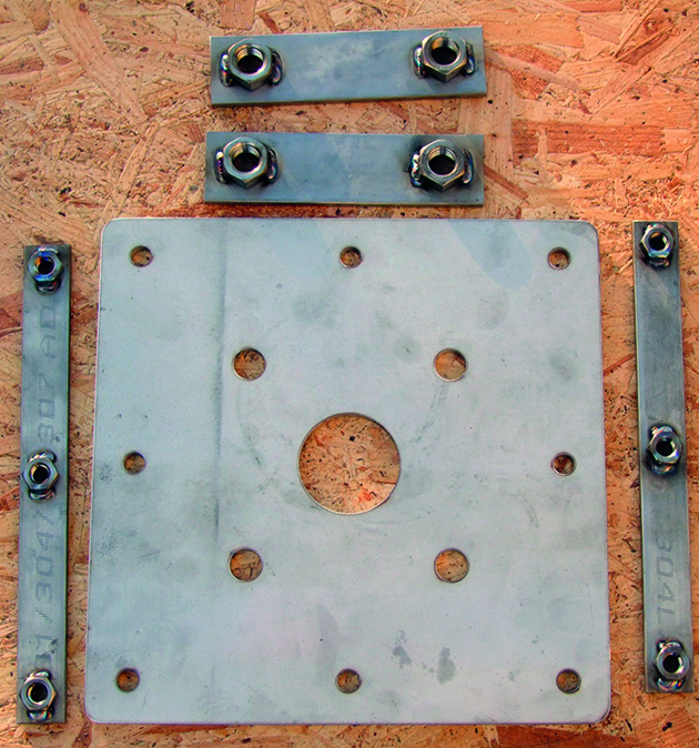 A mounting plate for a boat steering system