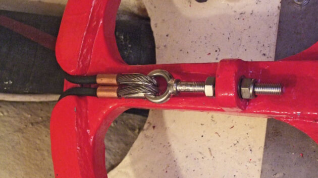 Steering cables on a steering quadrant on a boat