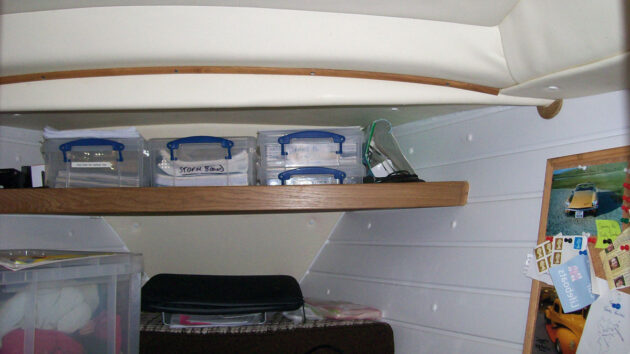 A bow cabin lined for insulation on a boat