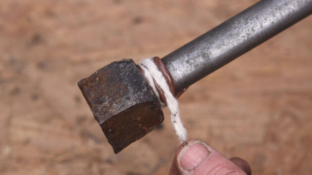 A grommet around a keel bolt as part of replacing keel bolts on a boat