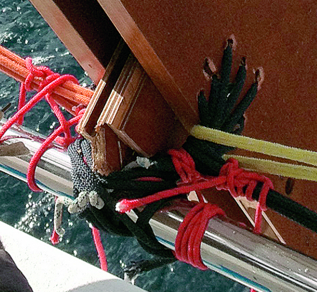 A close up photo of a jury rudder on a boat